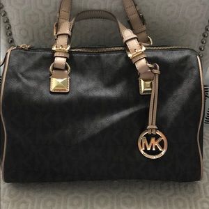 Michael Kors signature jet logo handbag